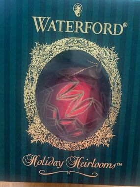 Waterford Red Glass Ornament with Gold Glitter Accents with PGA Logo.